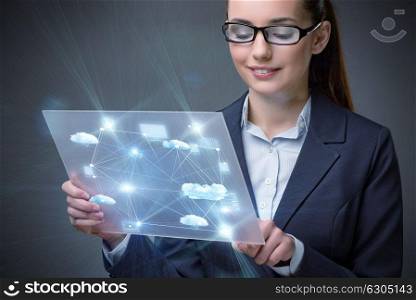 Woman with tablet in cloud computing concept