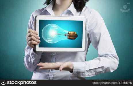 Woman with tablet pc . Woman sharing her bright idea using tablet computer