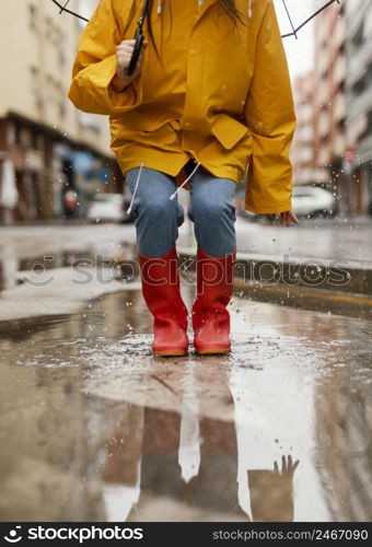 woman with umbrella standing rain