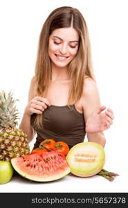 Woman with vegetables and fruits over white background