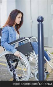 woman with wheelchair outdoors