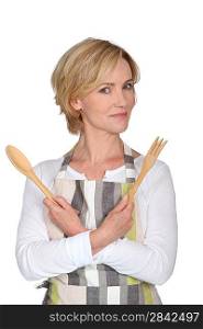 woman with wooden cutlery
