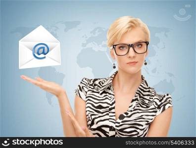 woman with world map showing virtual envelope