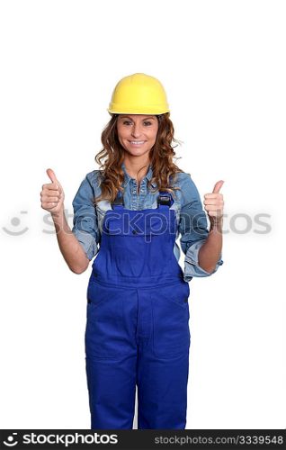 Woman with yellow security helmet standing on white background