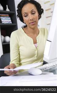 Woman Working at a Computer
