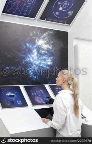 woman working digital monitors