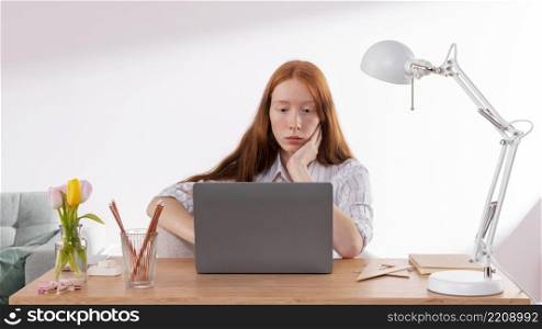 woman working from home laptop