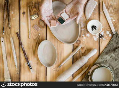 woman working her pottery workshop 3