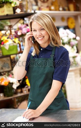 Woman working in florist
