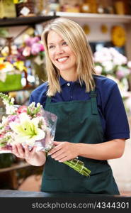 Woman working in florist