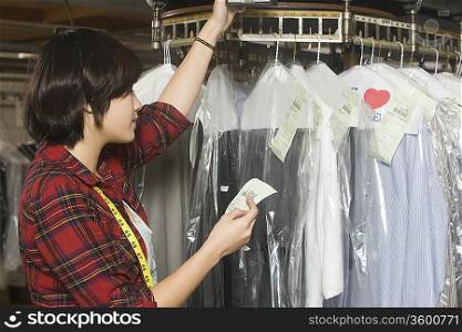 Woman working in the laundrette