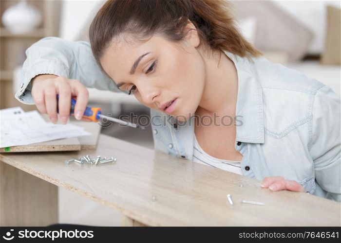 woman working on a furniture