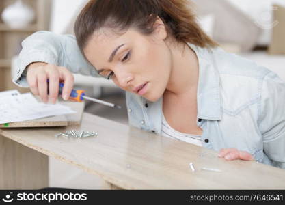 woman working on a furniture
