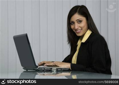 Woman working on a laptop