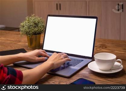 Woman working on laptop with white screen. Work from home.