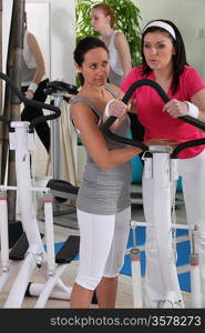 Woman working out with her coach