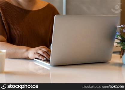 Woman working typing on keyboard laptop computer searching information on keyboard close up. technology digital, online communication, working from home, freelancing, e-commerce,