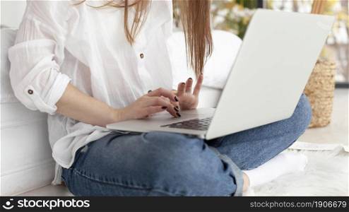 woman working with her laptop her lap. High resolution photo. woman working with her laptop her lap. High quality photo
