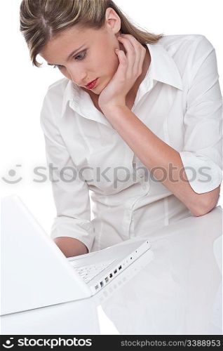 Woman working with laptop on white background