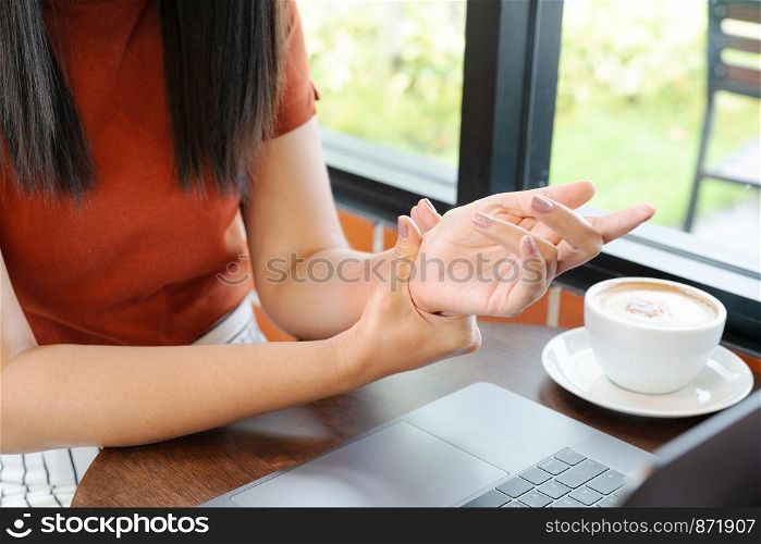 woman wrist hand arm pain long use mouse working. office syndrome healthcare and medicine concept