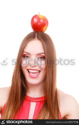 Woman young beautiful female long hair colorful make up holds big red apple fruit on head. Healthy eating, vegetarian food, diet and people concept. Beautiful woman holds apple fruit on head