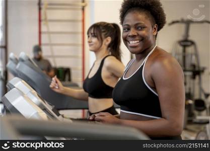 wome n gym running treadmill