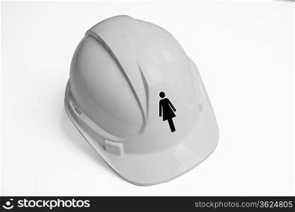 Women&acute;s symbol on hard hat against white background