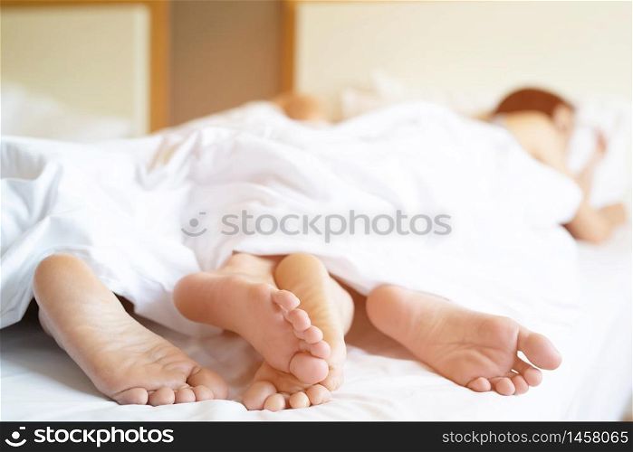 Women and men Having sex in the bedroom at the hotel