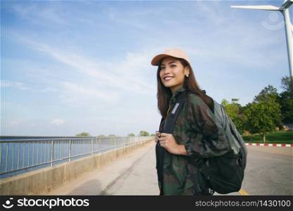 women asian with bright backpack for the tourist traveler