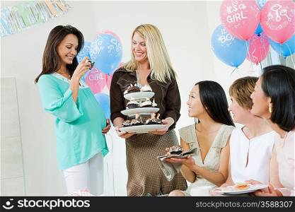Women at a Baby Shower with Cupcakes