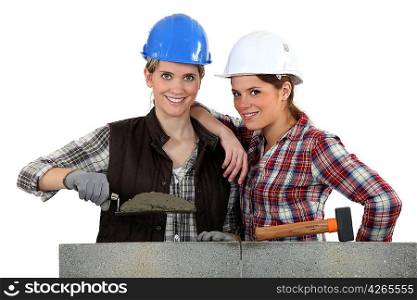 Women building wall