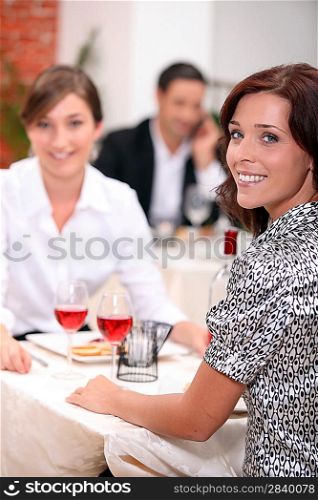 Women eating out in a restaurant together