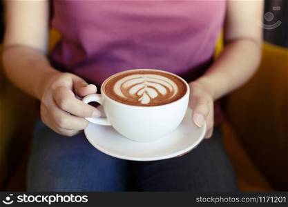 women enjoy coffee at a coffee shop