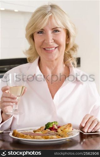 Women Enjoying meal,mealtime With A Glass Of Wine