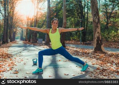 Women Exercising Outdoors, Park, Nature. Woman Stretching in the Park.