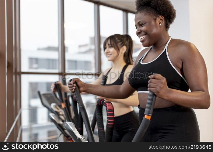 women exercising treadmill