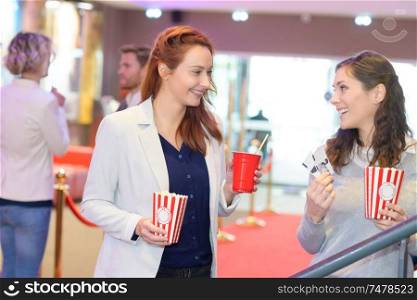 women going to the movie theater