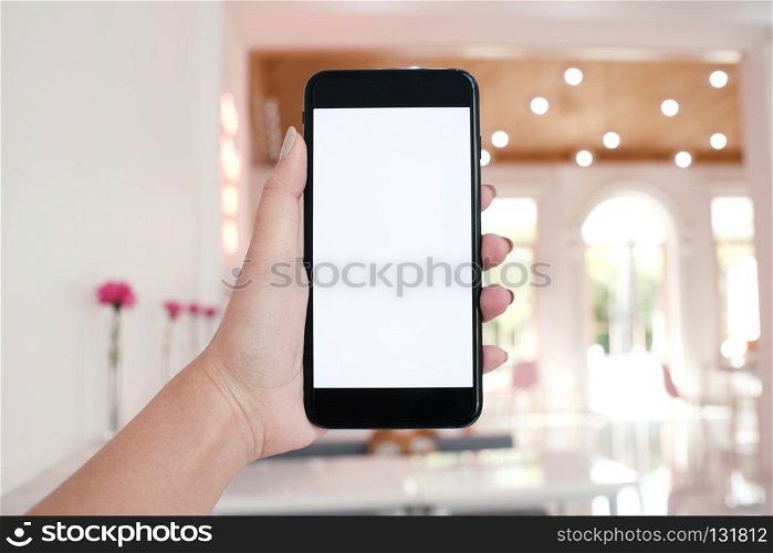 Women hands holding cell telephone blank copy space screen. smart phone with technology concept.