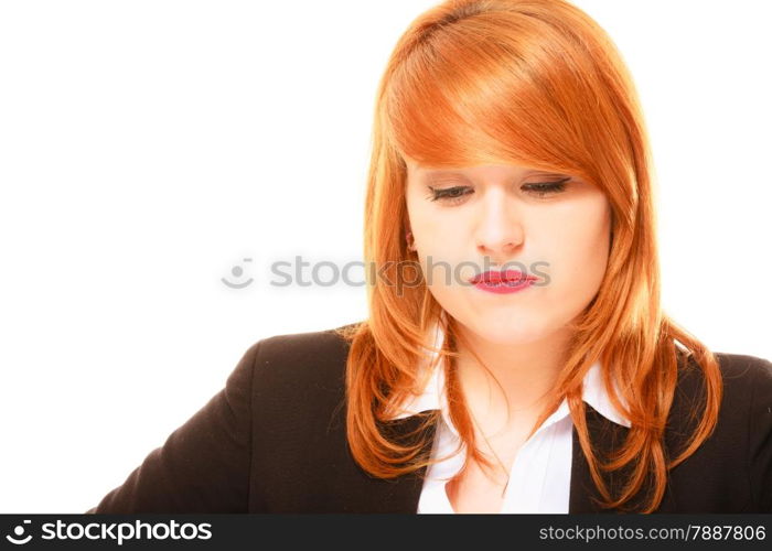 Women in business. Job concept. Disappointed young red haired businesswoman on white background in studio.