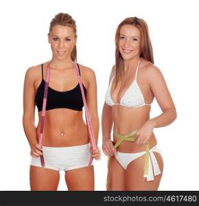 Women in lingerie with tape measures isolated on a white background