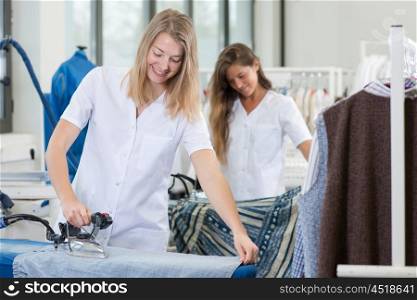 women ironing clothes