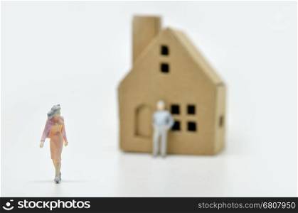 Women is leaving her man and house. Relationship concept