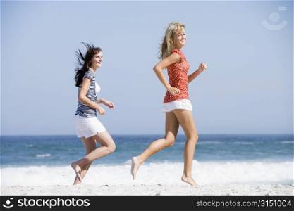 Women jogging on a beach