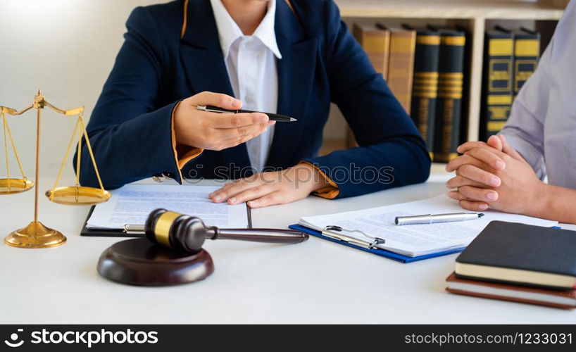 Women lawyer discussing with clients in courtroom. justice and law ,attorney, court judge, meeting concept.