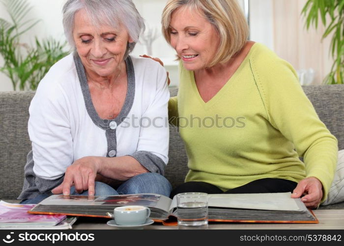 Women looking at a photo album