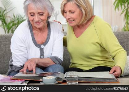 Women looking at a photo album
