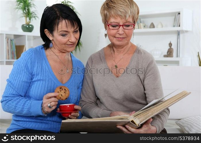 Women looking at an album