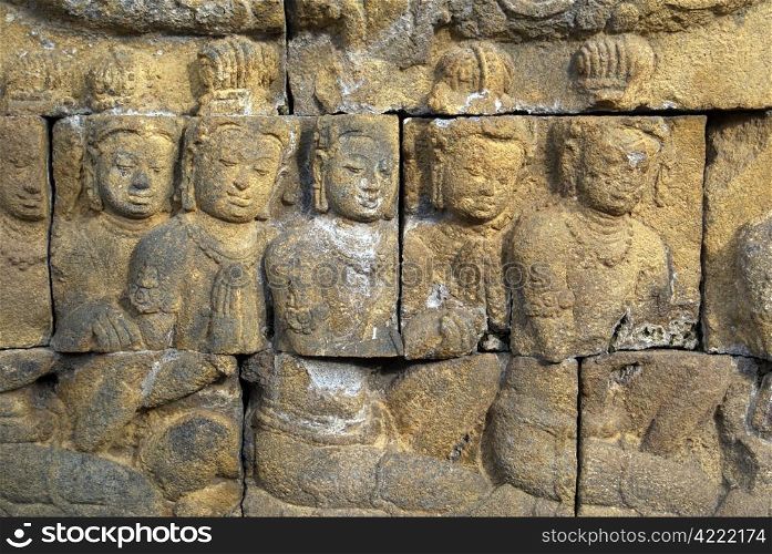 Women on the wall of Borobudur, Java, Indonesia