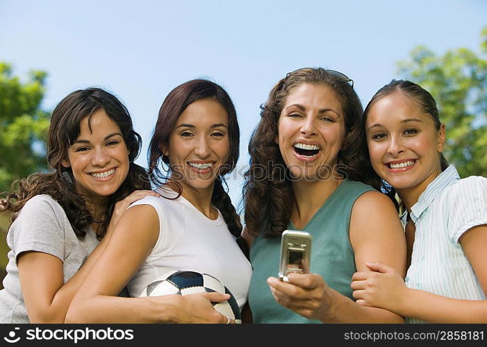 Women Photographing Themselves with Cell Phone