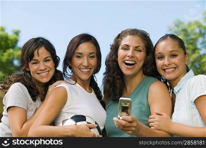 Women Photographing Themselves with Cell Phone